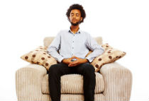 Image of man meditating.